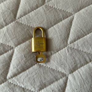 Louis Vuitton Gold Lock and Key